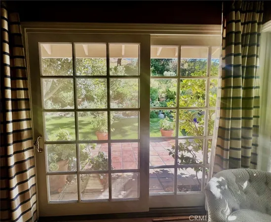 a view of a living room and dining room