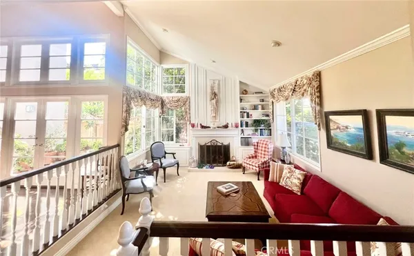 a view of a living room filled with furniture