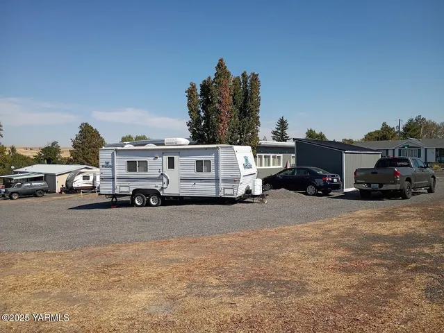a bus parked in front of a house