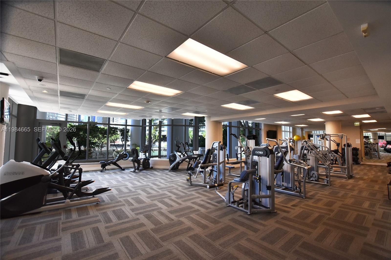 801 Brickell Key Boulevard, Unit 1209 Miami, FL 33131 - Photo 31 of 52 a view of a room with gym equipment
