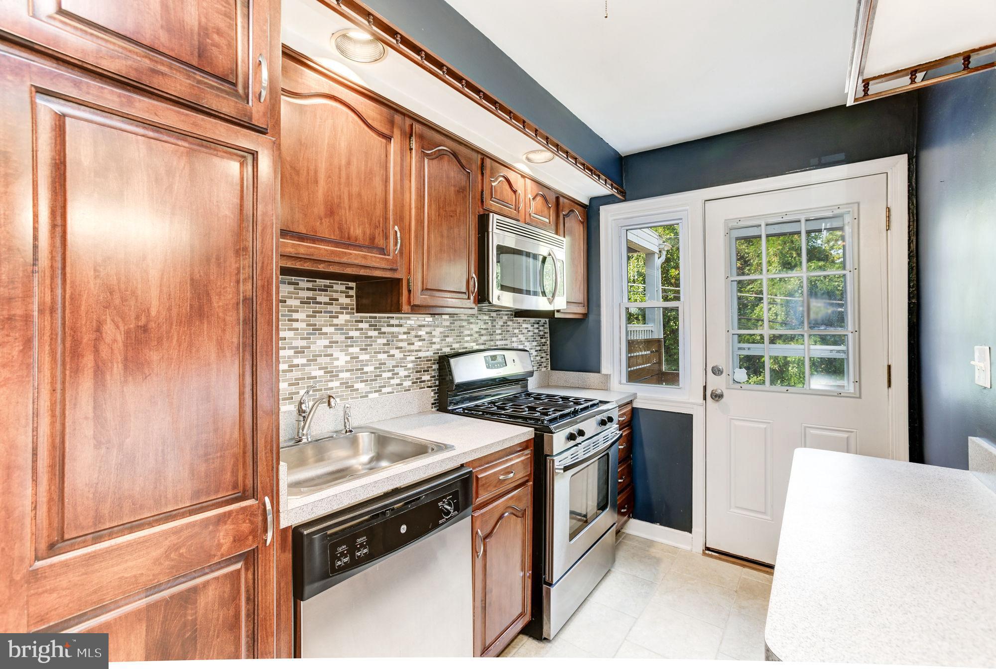 1116 Elm Road Halethorpe, MD 21227 - Photo 12 of 43 Updated kitchen with door to deck!