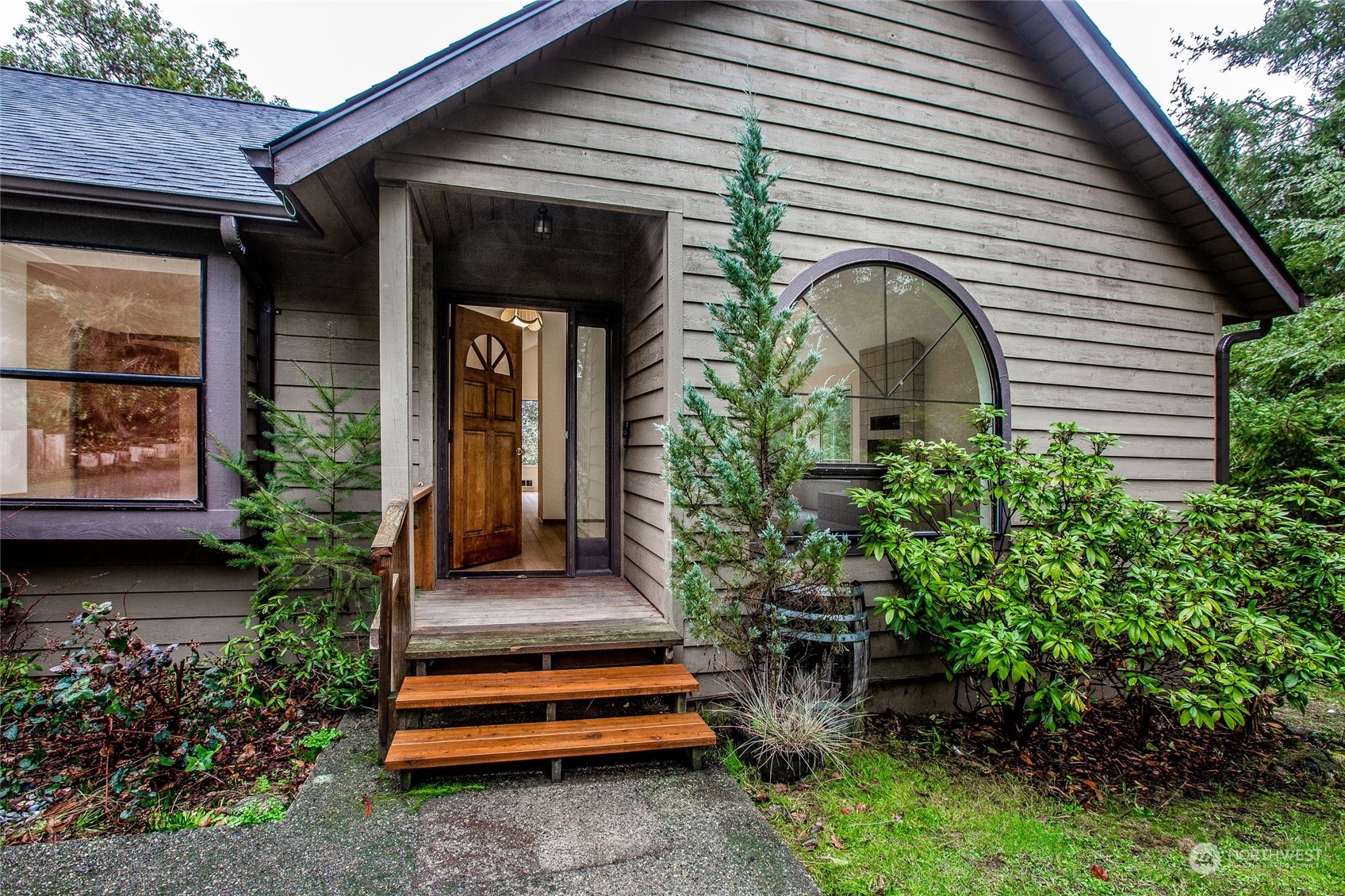 198 Ridgedale Road Friday Harbor, WA 98250 - Photo 17 of 39 a front view of a house with a garden