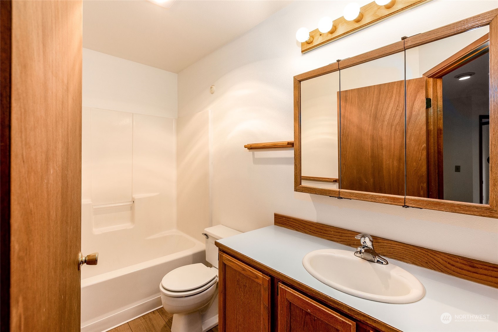 198 Ridgedale Road Friday Harbor, WA 98250 - Photo 25 of 39 a bathroom with a sink a toilet and shower curtain