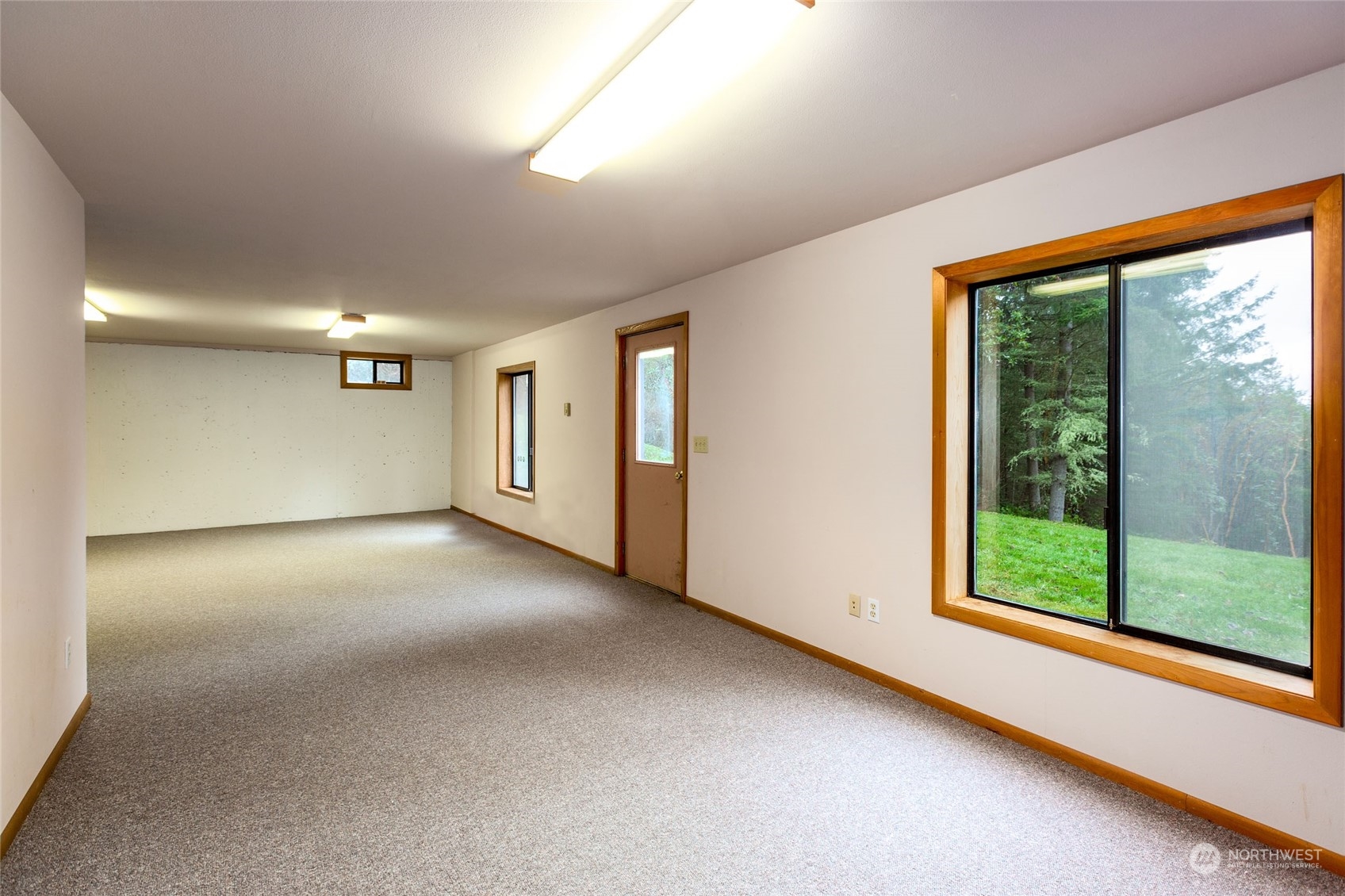 198 Ridgedale Road Friday Harbor, WA 98250 - Photo 33 of 39 a view of empty room with floor to ceiling window