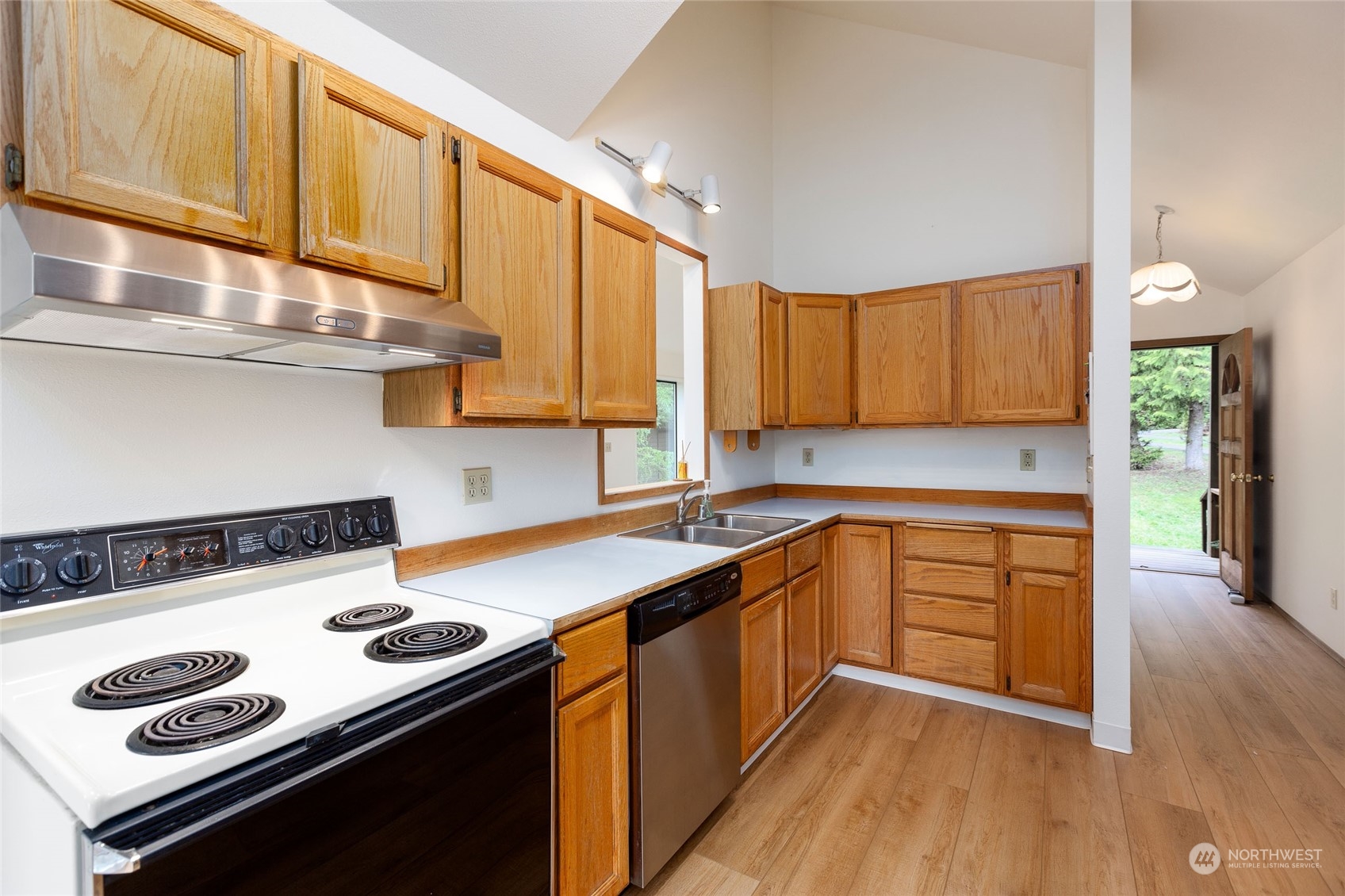 198 Ridgedale Road Friday Harbor, WA 98250 - Photo 10 of 39 a kitchen with a sink a stove and cabinets