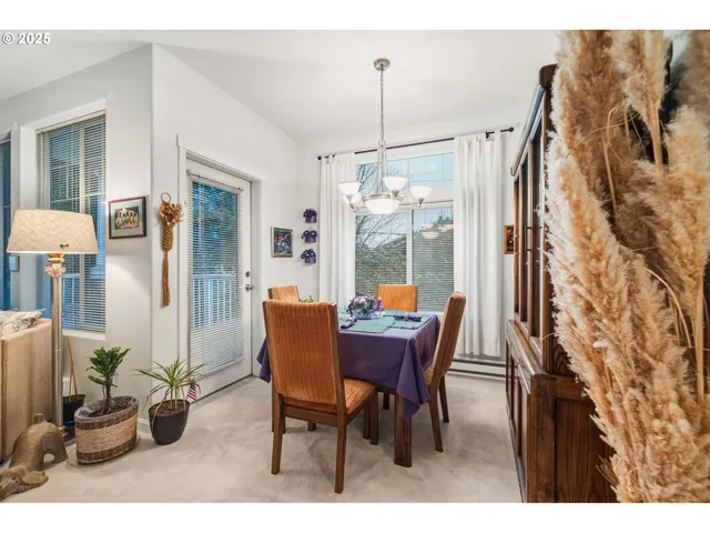 a bedroom with a bed and a table