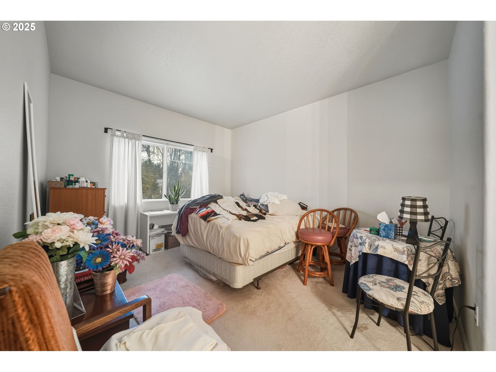 14615 Southwest Beard Road, Unit 101 Beaverton, OR 97007 - Photo 22 of 28 a living room with furniture and a window