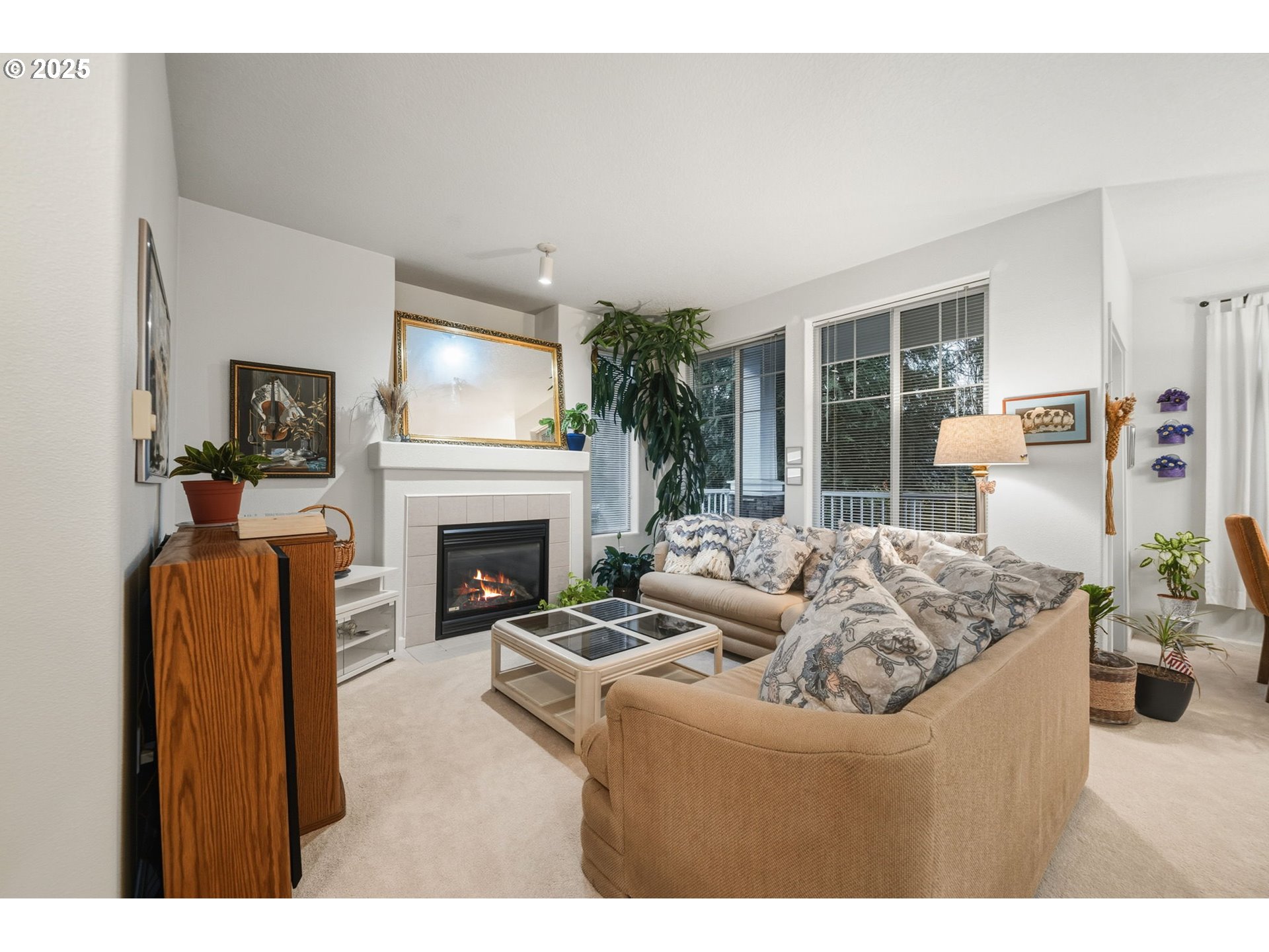 14615 Southwest Beard Road, Unit 101 Beaverton, OR 97007 - Photo 6 of 28 a living room with furniture and a fireplace
