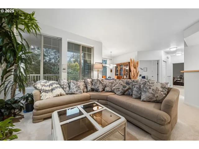 a kitchen with cabinets and wooden floor