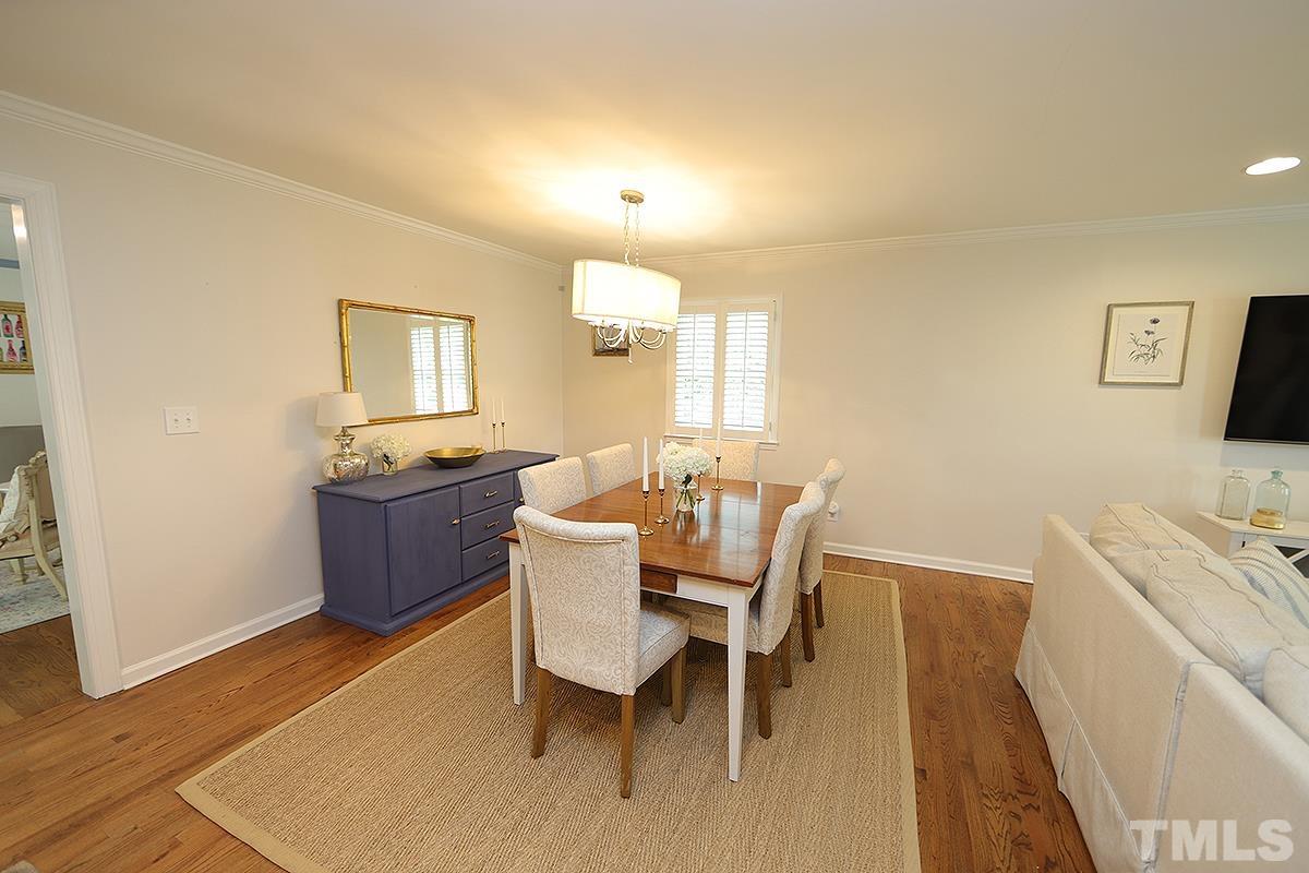 3404 Blue Ridge Road Raleigh, NC 27612 - Photo 15 of 36 a dining room with furniture and window