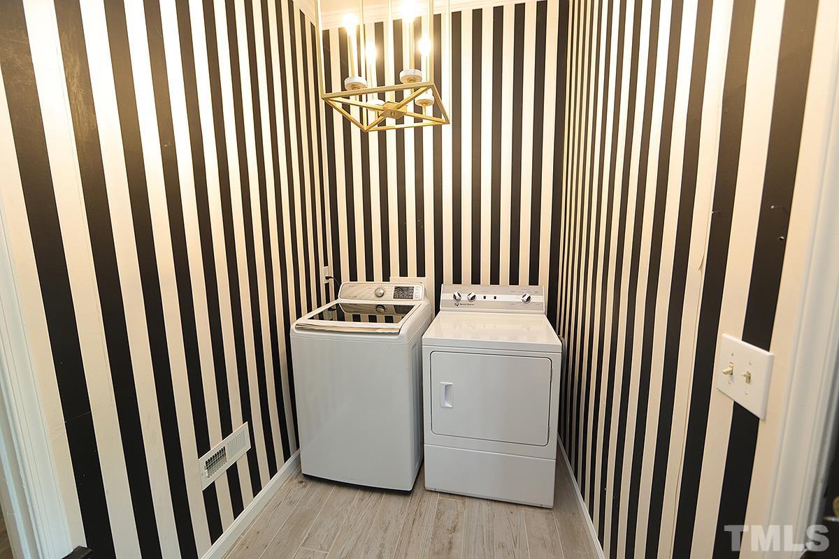 3404 Blue Ridge Road Raleigh, NC 27612 - Photo 19 of 36 a utility room with dryer and washer
