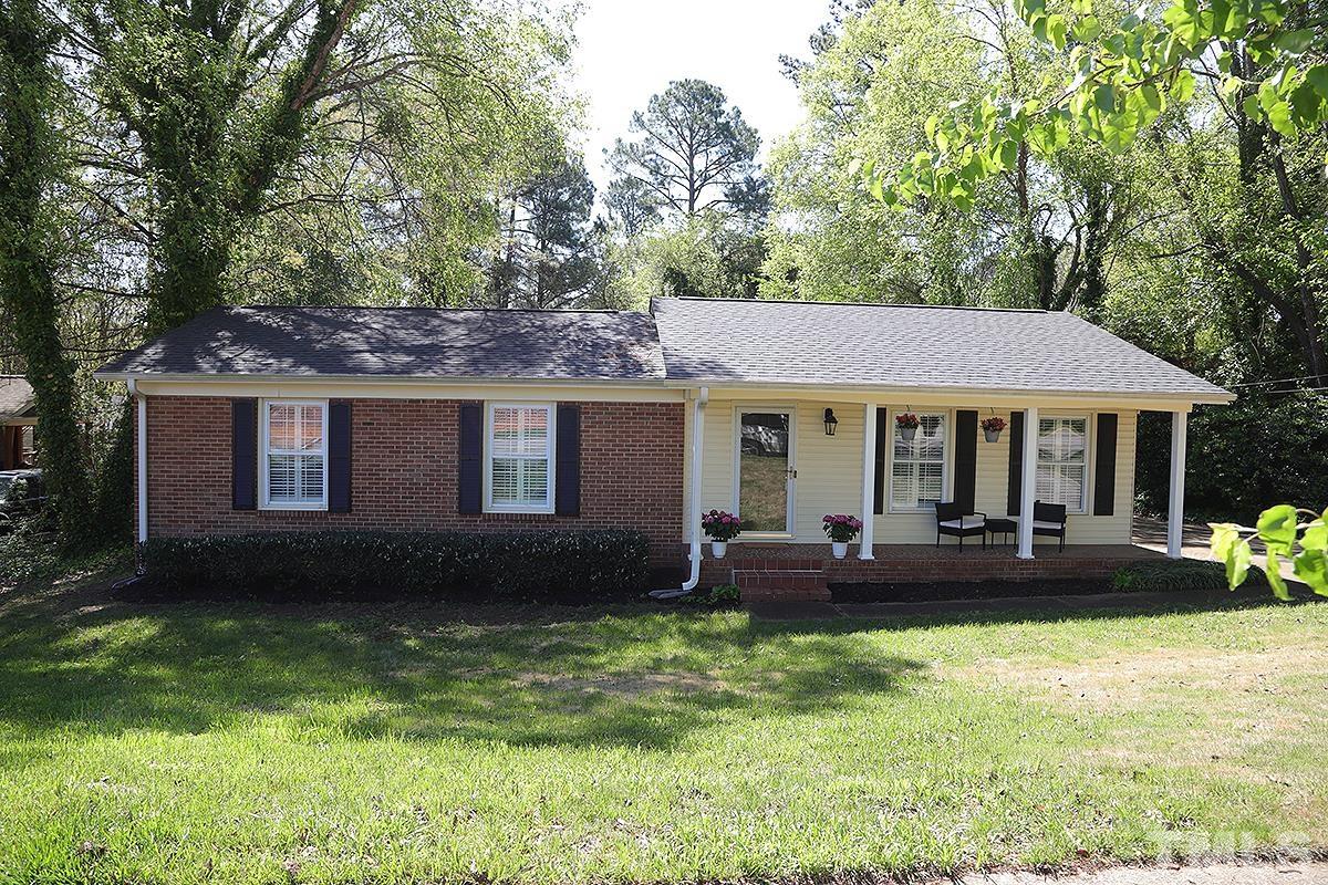 3404 Blue Ridge Road Raleigh, NC 27612 - Photo 3 of 36 a view of a house with a yard and sitting area