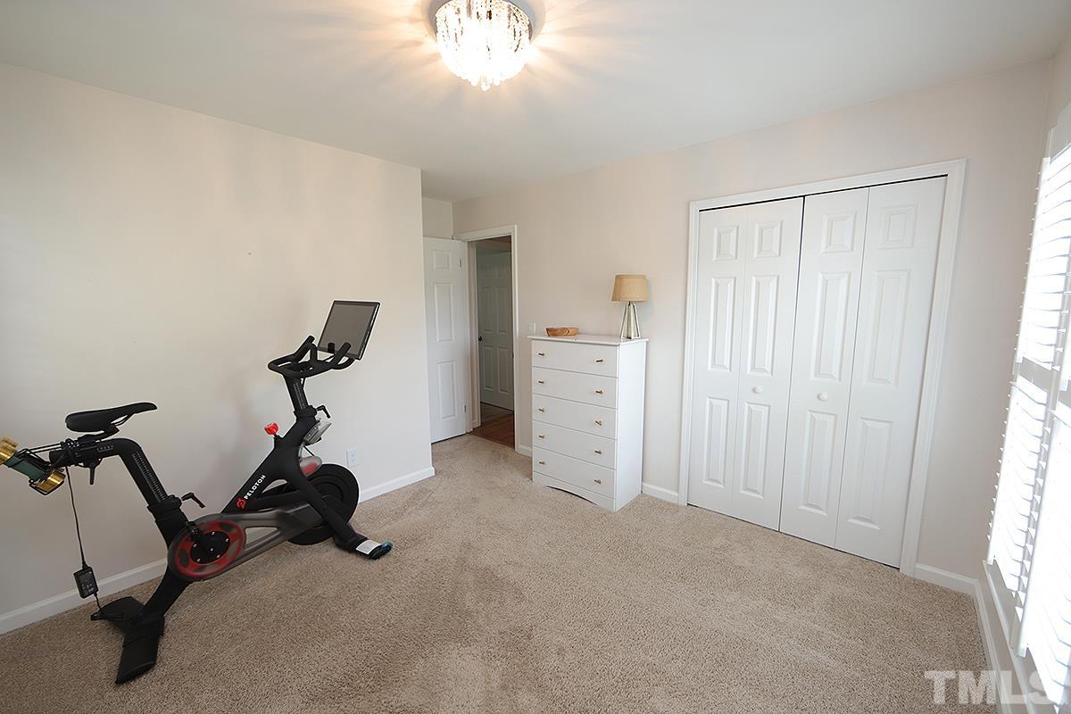 3404 Blue Ridge Road Raleigh, NC 27612 - Photo 31 of 36 a view of room with gym equipment