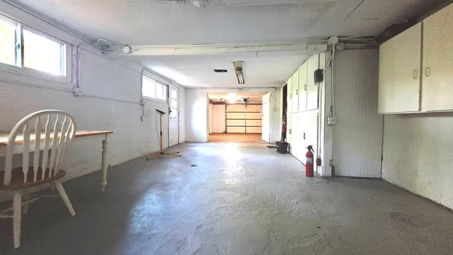 a view of a livingroom with a staircase