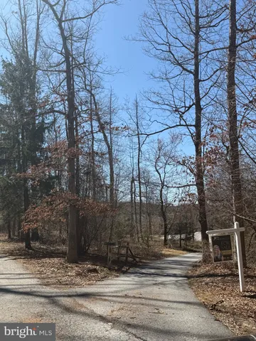 a view of patio with a yard