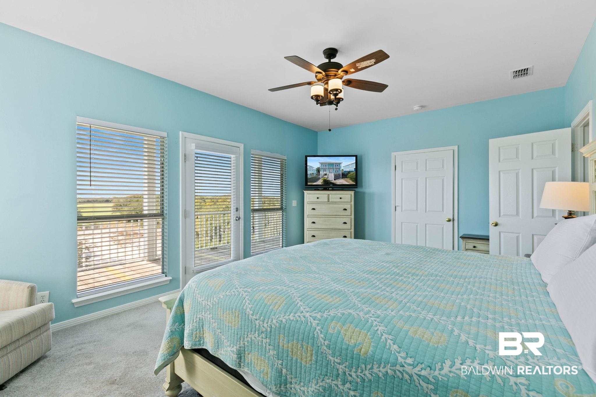 545 Plantation Road, Unit 3 Gulf Shores, AL 36542 - Photo 25 of 54 Carpeted bedroom featuring access to outside and ceiling fan