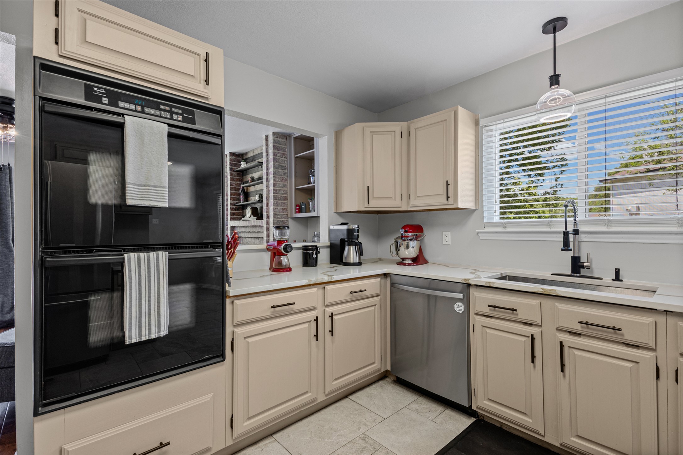 3011 Wadsworth Way Austin, TX 78748 - Photo 22 of 35 Well-equipped kitchen with double ovens and ample counter space, perfect for culinary endeavors.
