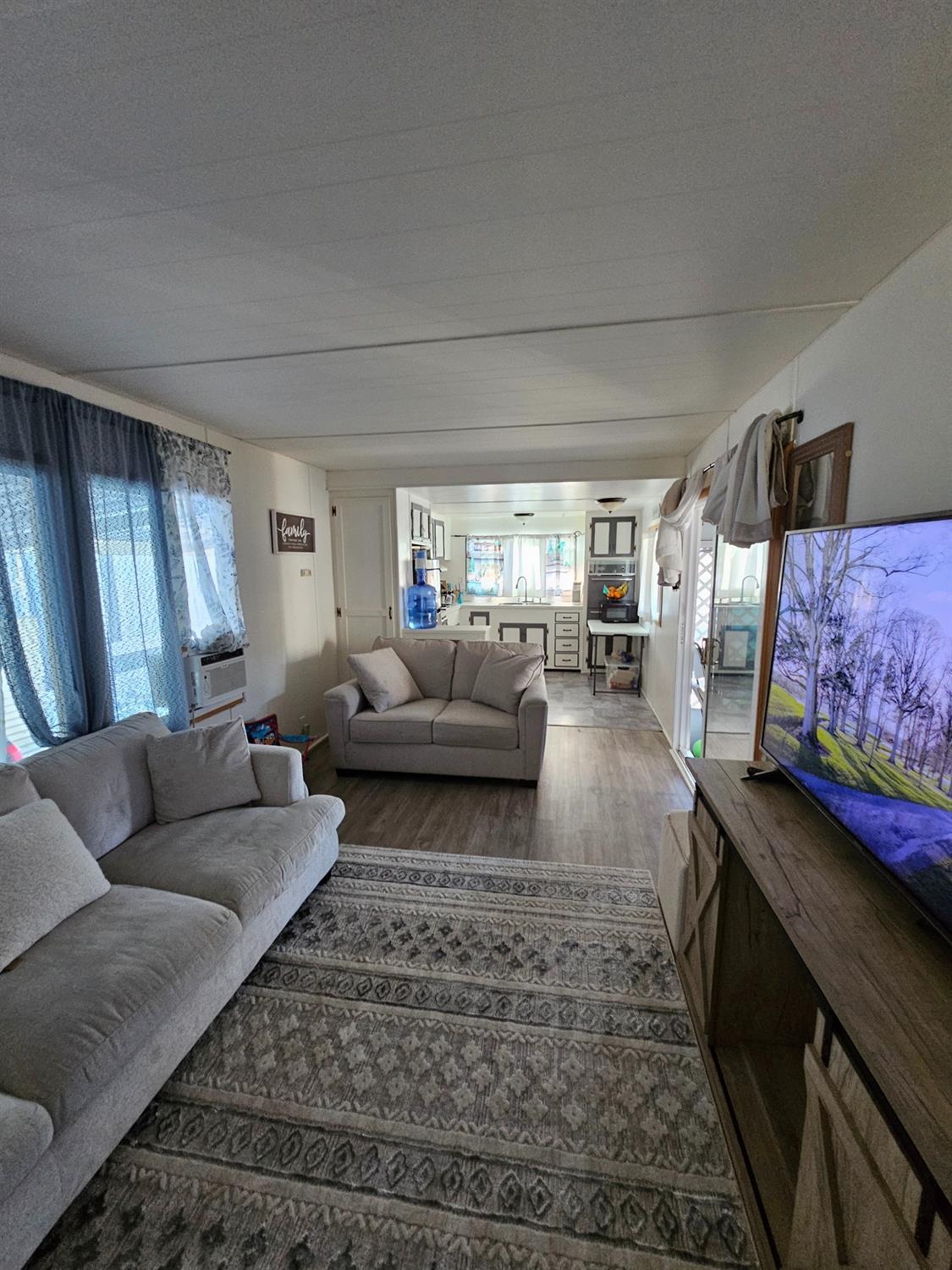 6 Hanford Avenue Concord, CA 94518 - Photo 2 of 10 a living room with furniture and a couch