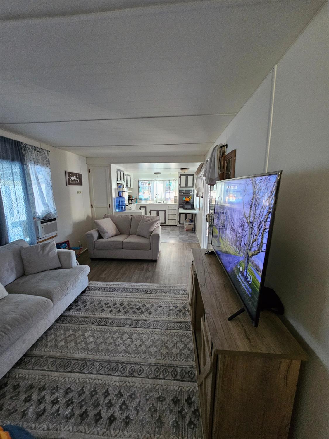 6 Hanford Avenue Concord, CA 94518 - Photo 7 of 10 a living room with furniture and a couch