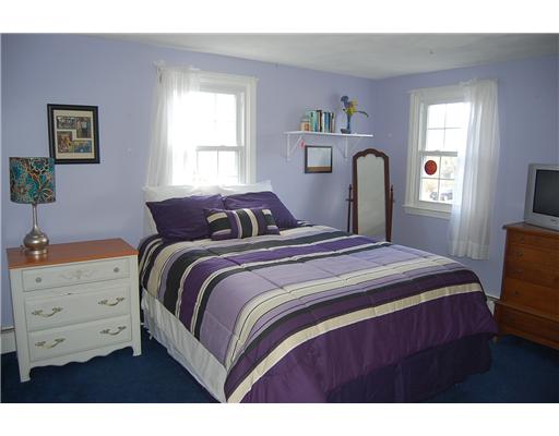 10 Old River Road Barrington, RI 02806 - Photo 8 of 11 Bedroom. Double bedroom with double closets. Hardwood floors under the wall to wall carpeting.