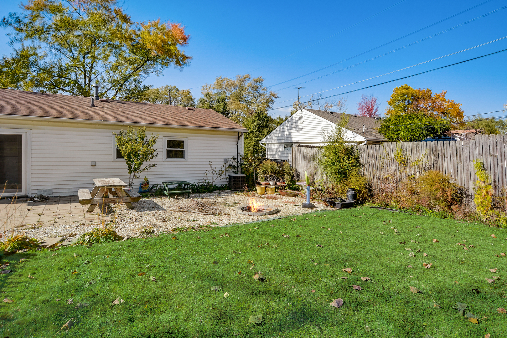 419 South Oltendorf Road Streamwood, IL 60107 - Photo 19 of 24 a view of a chair and table in backyard of the house