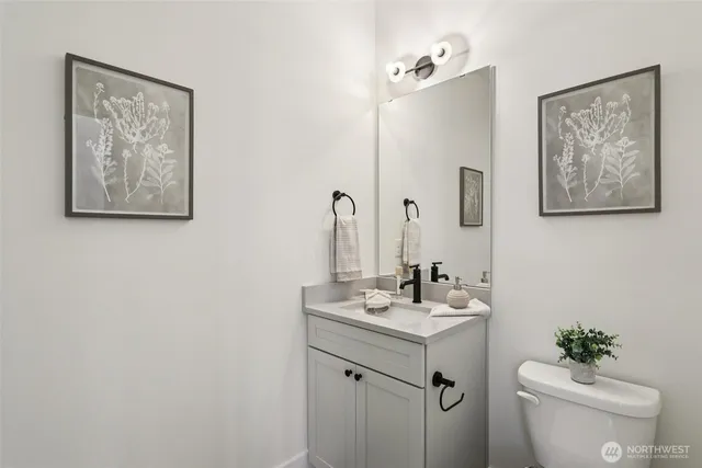 a view of a hallway with furniture