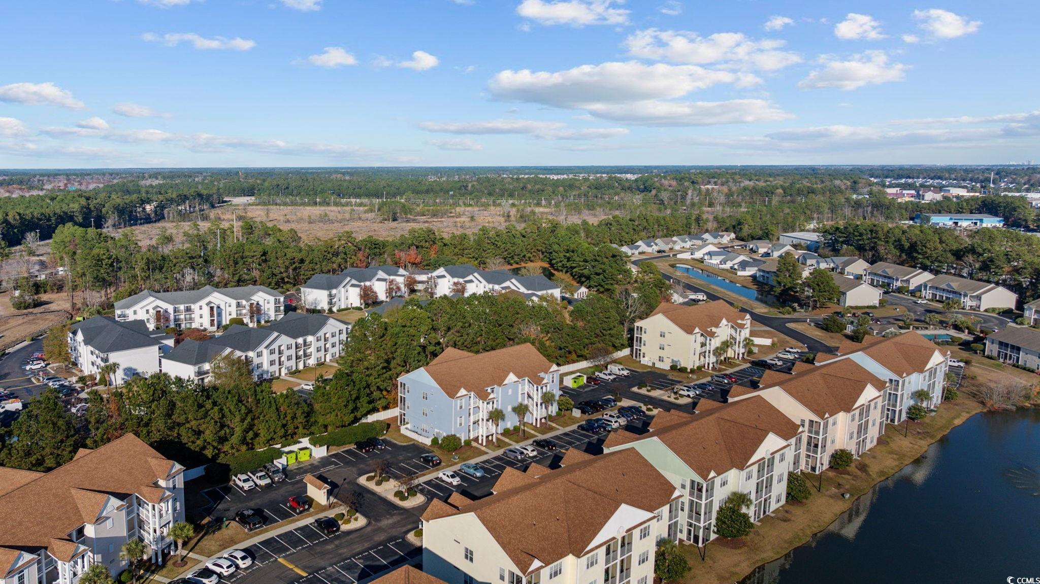 111 Fountain Pointe Lane, Unit 104 Myrtle Beach, SC 29579 - Photo 28 of 30 Aerial overview of property's location featuring a large body of water