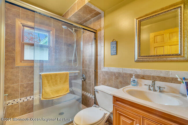 505 South Cooks Bridge Road Jackson, NJ 08527 - Photo 16 of 30 a bathroom with a sink toilet and shower