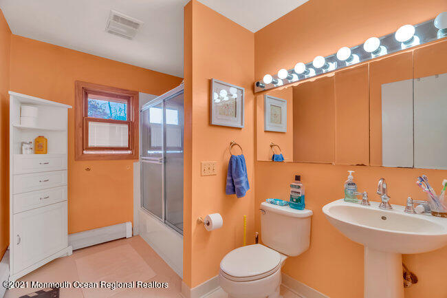 505 South Cooks Bridge Road Jackson, NJ 08527 - Photo 21 of 30 a bathroom with a sink a toilet and shower