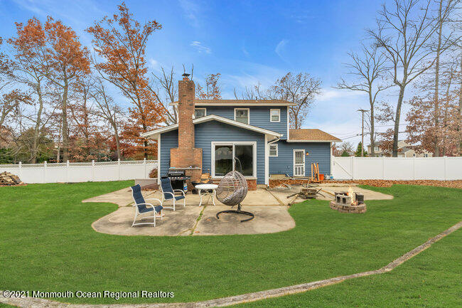 505 South Cooks Bridge Road Jackson, NJ 08527 - Photo 27 of 30 a view of a house with backyard sitting area and garden