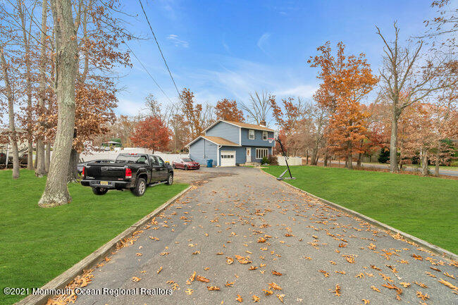 505 South Cooks Bridge Road Jackson, NJ 08527 - Photo 4 of 30 a front view of a house with a yard