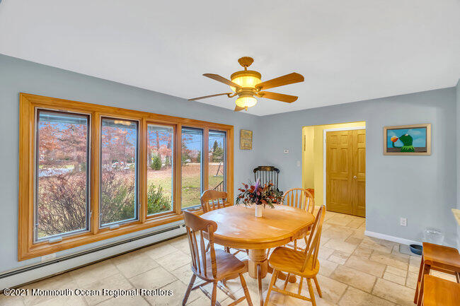505 South Cooks Bridge Road Jackson, NJ 08527 - Photo 8 of 30 a view of a dining room with furniture and a large window
