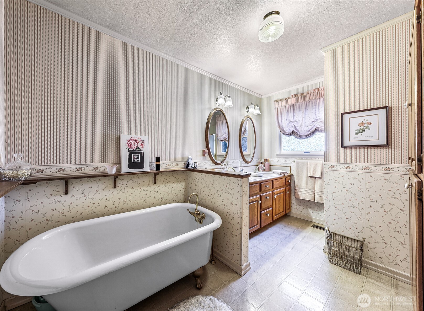 8634 Double Ditch Road Lynden, WA 98264 - Photo 9 of 40 a spacious bathroom with a tub sink and mirror