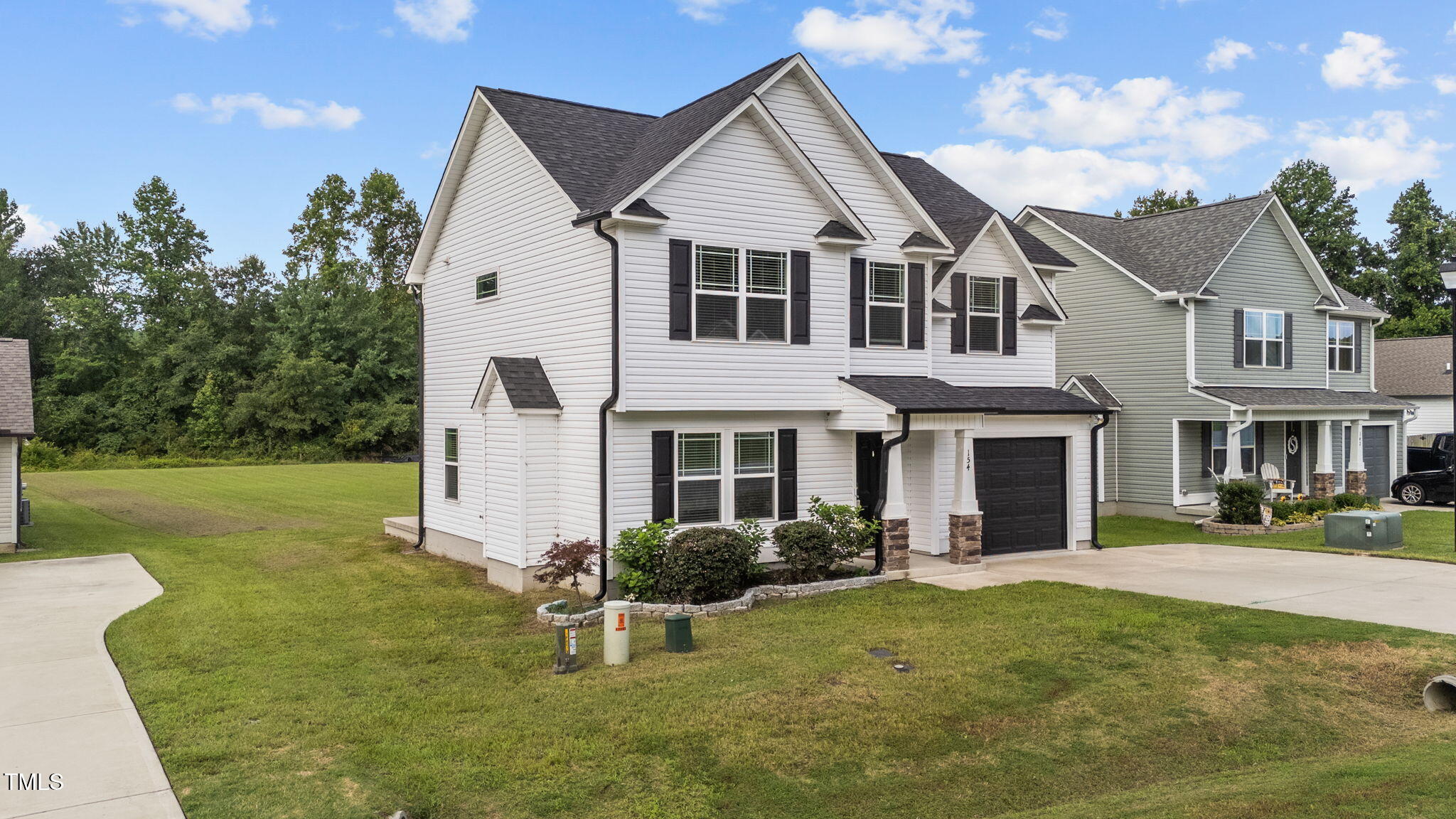 154 Winter Red Way Benson, NC 27504 - Photo 2 of 23 2-web-or-mls-DJI_20250716101656_0077_D