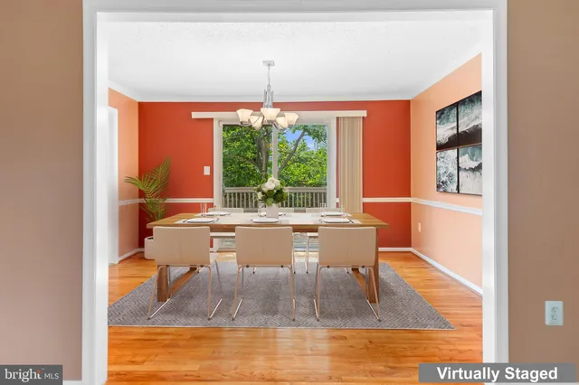 a kitchen with stainless steel appliances granite countertop a refrigerator and a stove