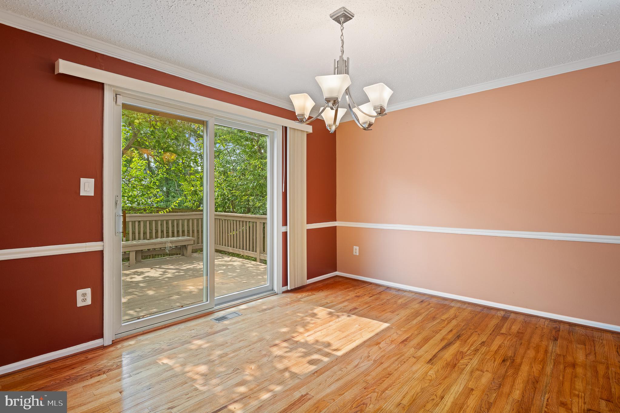 9 Coachlamp Court Silver Spring, MD 20906 - Photo 12 of 95 a view of empty room with wooden floor and fan