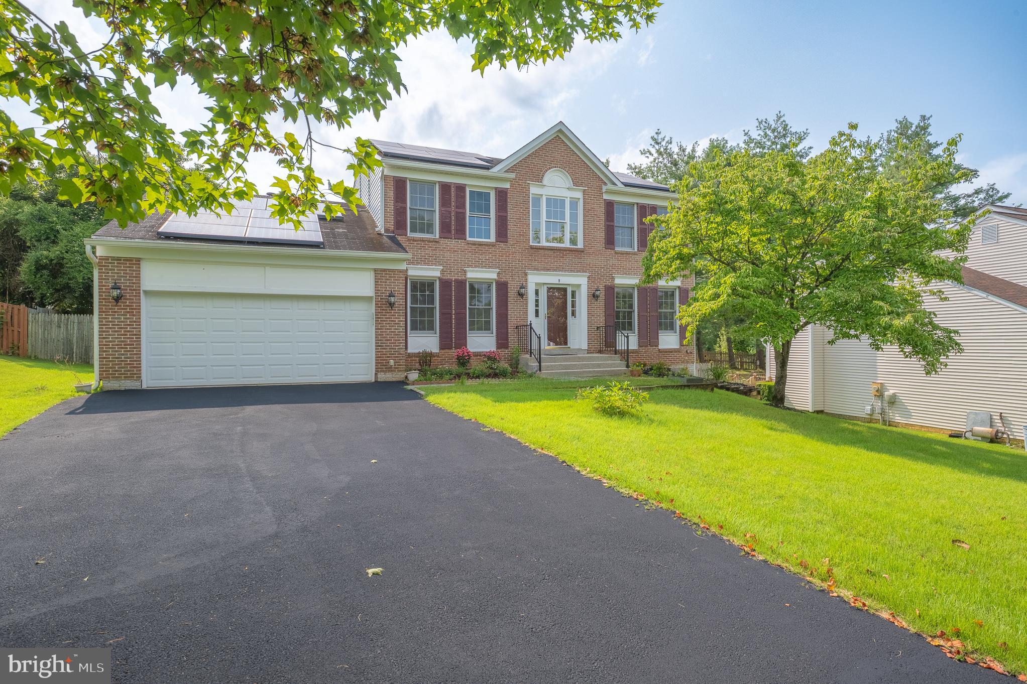 9 Coachlamp Court Silver Spring, MD 20906 - Photo 2 of 95 a house with swimming pool in front of it