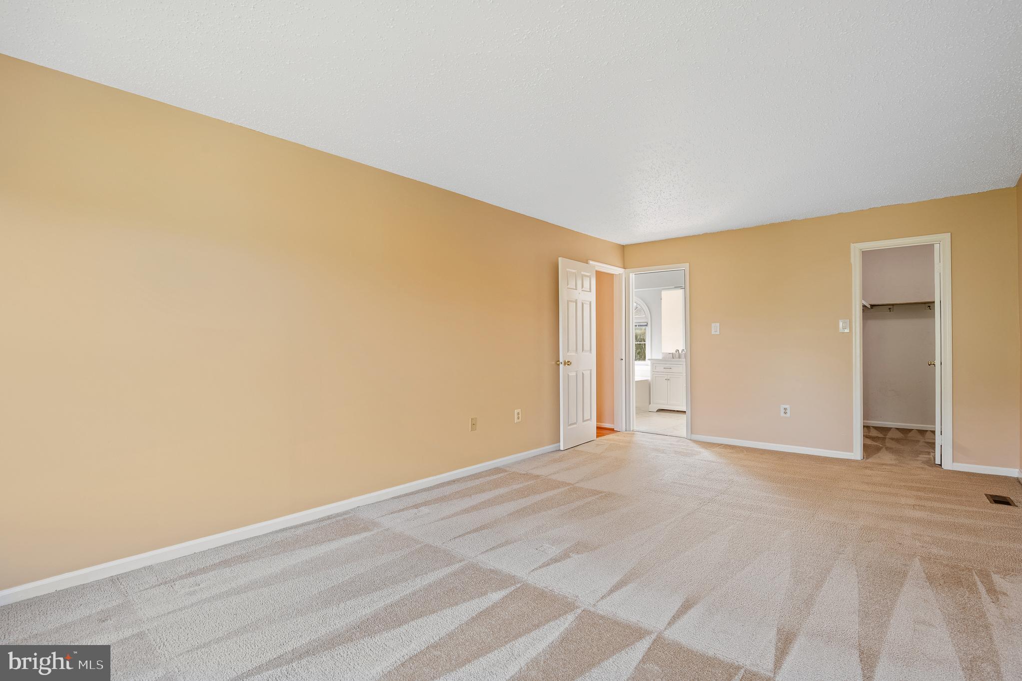 9 Coachlamp Court Silver Spring, MD 20906 - Photo 38 of 95 a view of an empty room with wooden floor