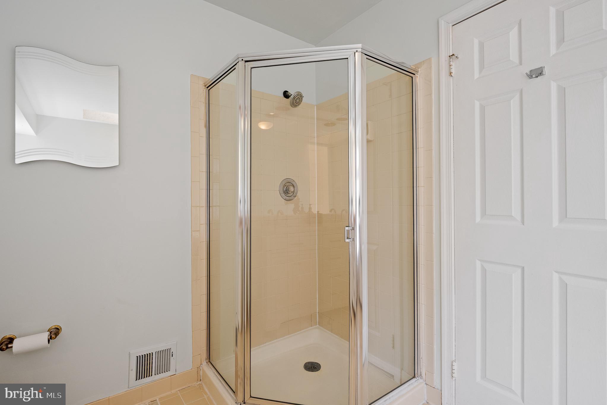 9 Coachlamp Court Silver Spring, MD 20906 - Photo 45 of 95 a bathroom with a glass shower door