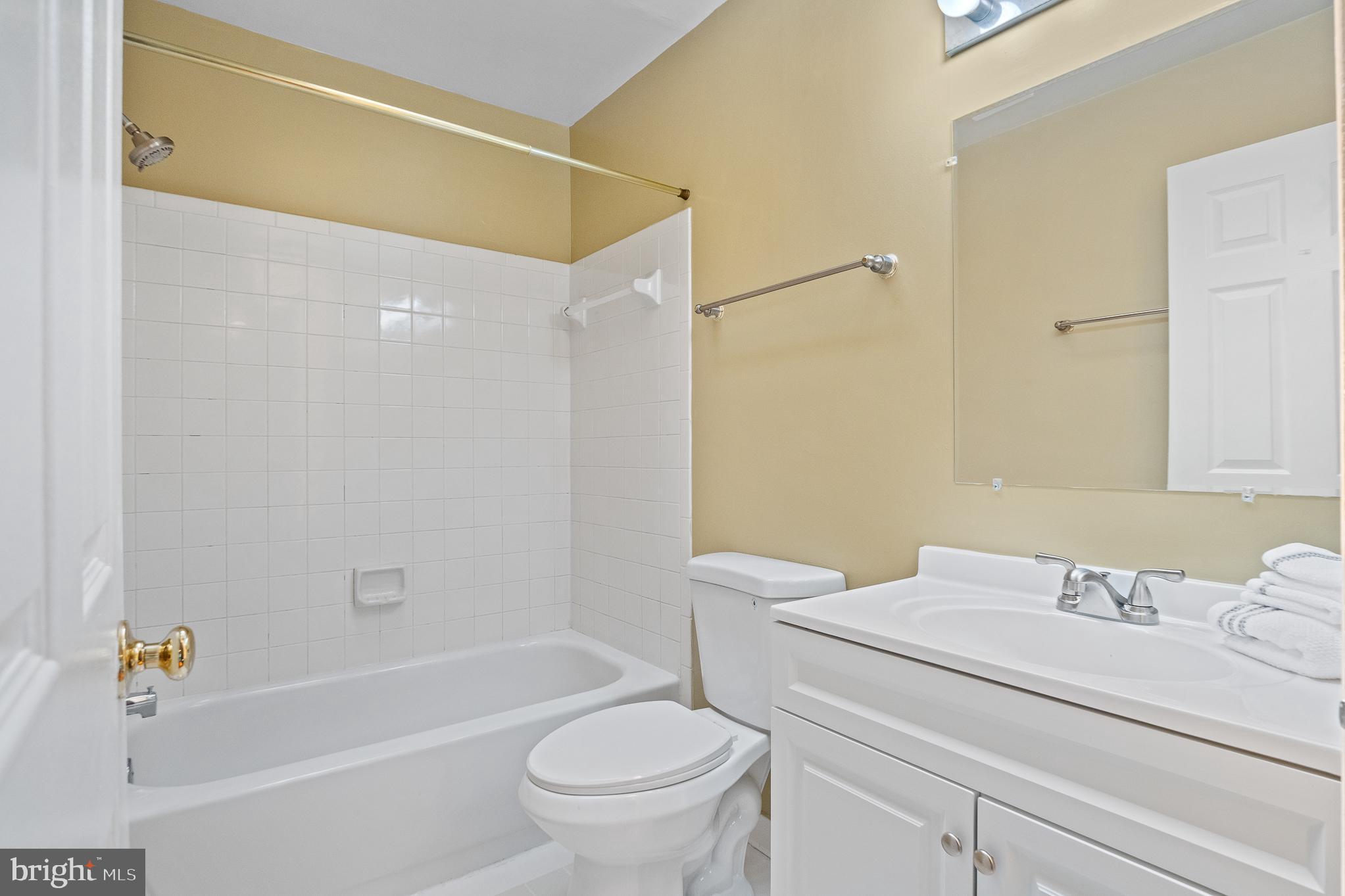 9 Coachlamp Court Silver Spring, MD 20906 - Photo 49 of 95 a bathroom with a sink toilet and shower