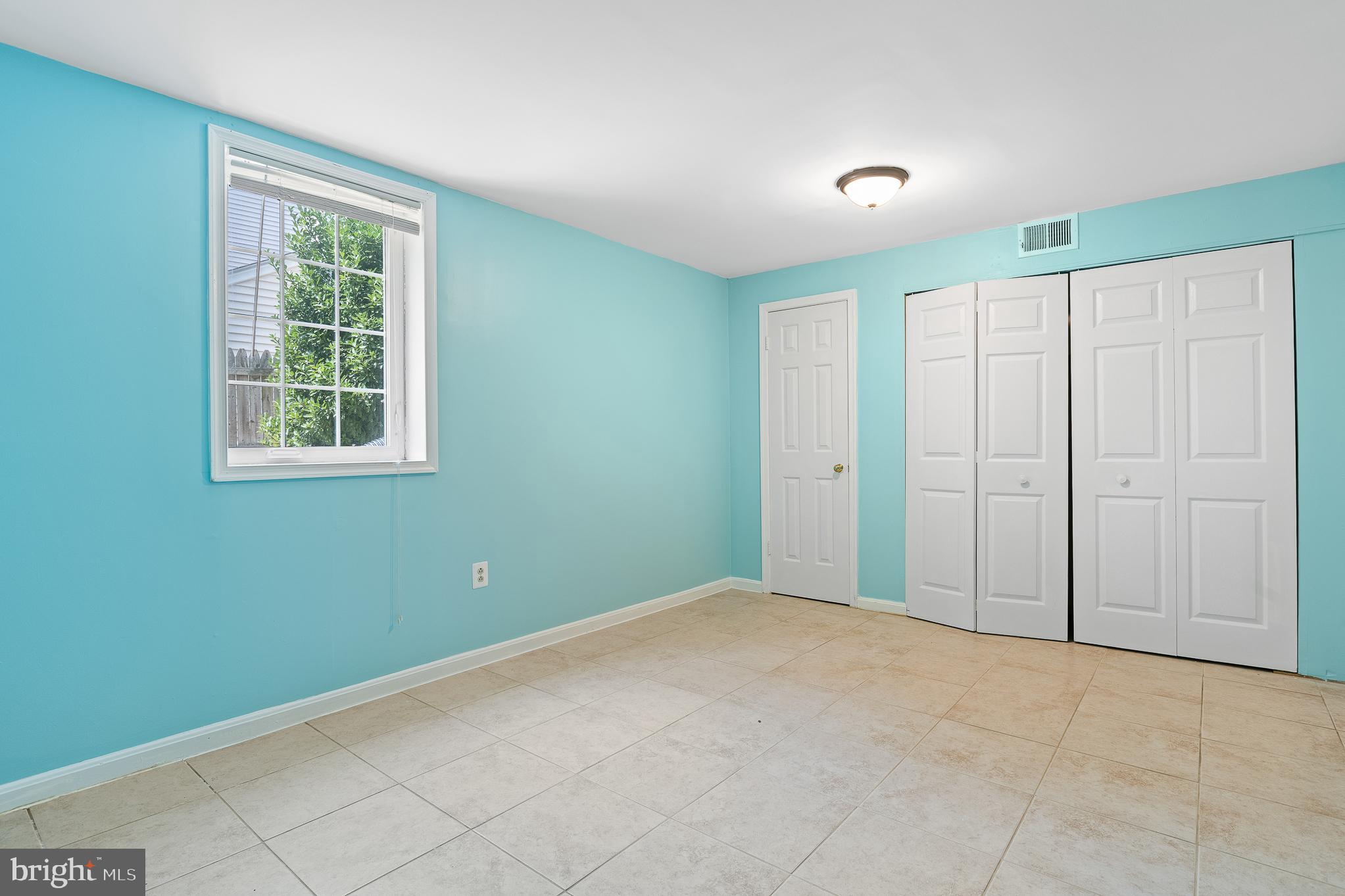 9 Coachlamp Court Silver Spring, MD 20906 - Photo 60 of 95 a view of an empty room with a window