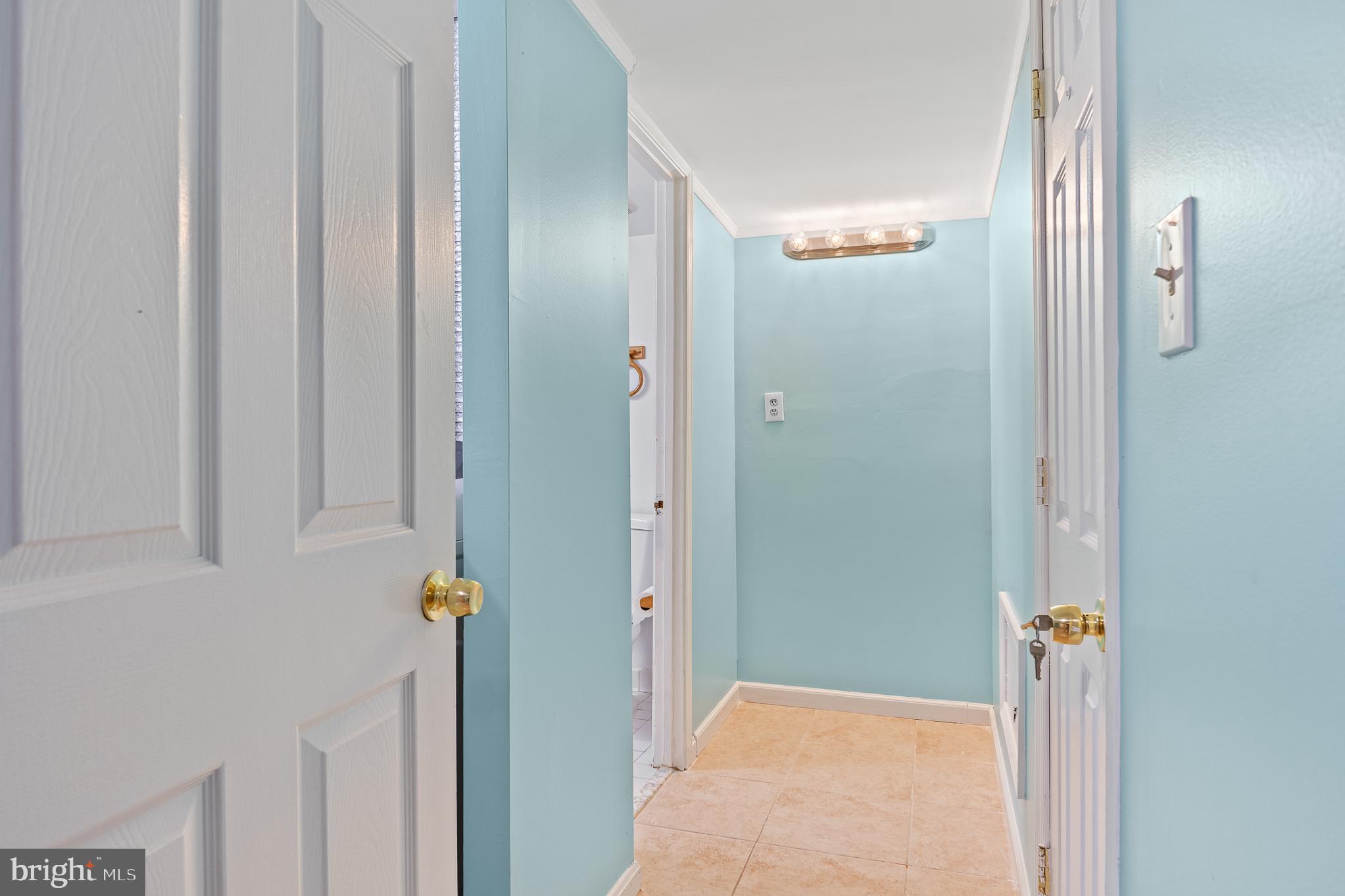 9 Coachlamp Court Silver Spring, MD 20906 - Photo 62 of 95 a view of a bathroom from a hallway