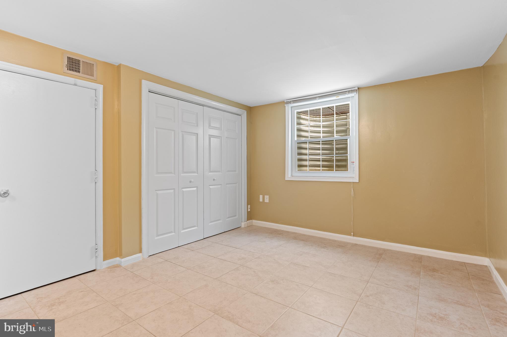 9 Coachlamp Court Silver Spring, MD 20906 - Photo 75 of 95 a view of an empty room with closet and windows