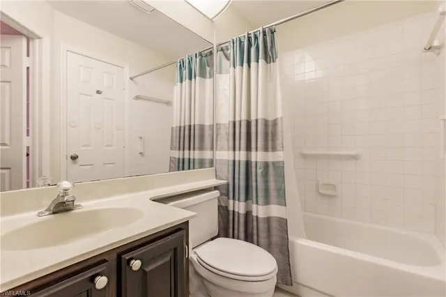 a bathroom with a sink a toilet and a bathtub