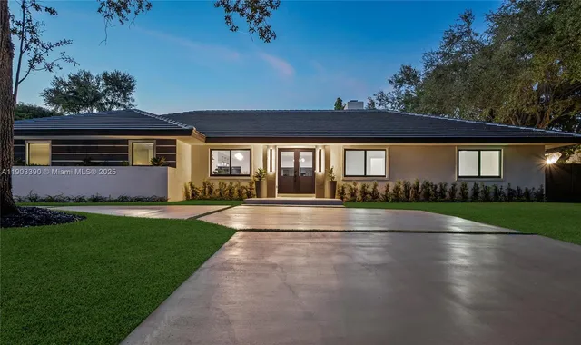 a view of swimming pool with a yard