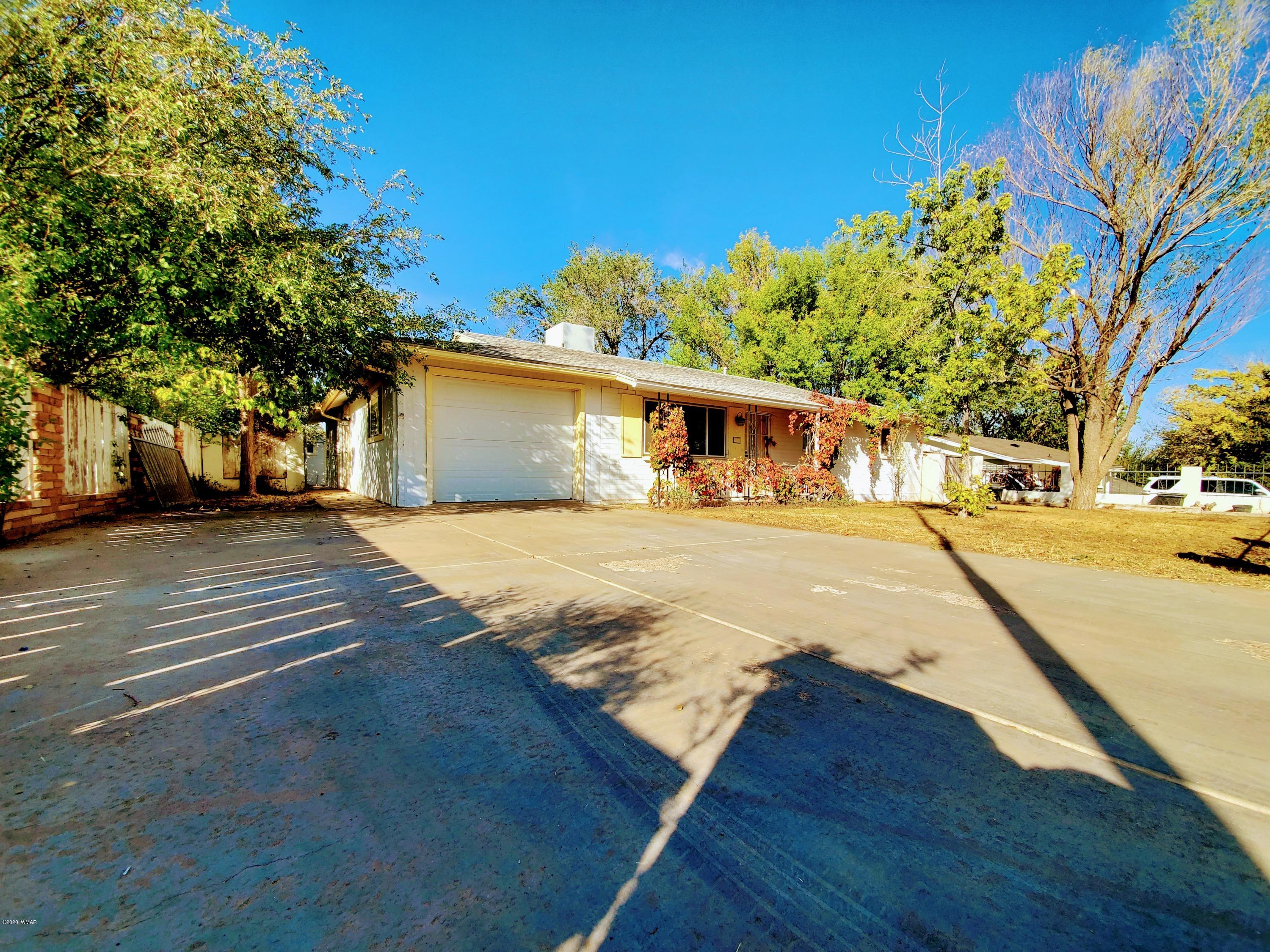 300 South 8th Street Snowflake, AZ 85937 - Photo 1 of 18 a view of residential houses with yard and road
