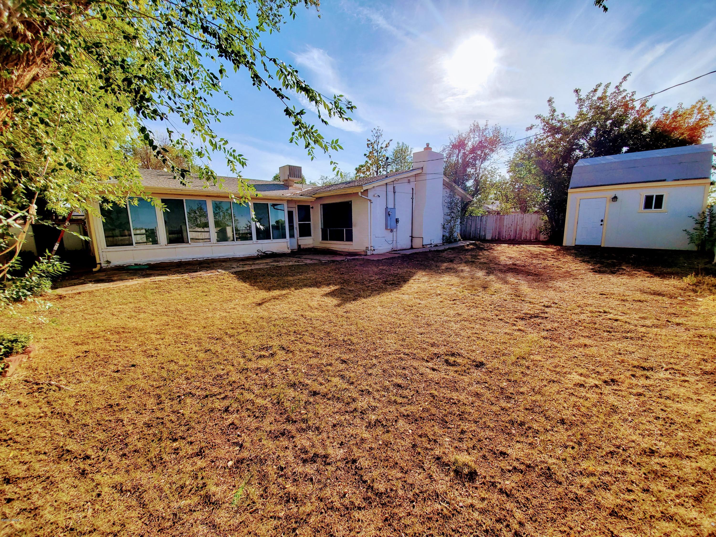 300 South 8th Street Snowflake, AZ 85937 - Photo 15 of 18 a view of a house with a yard