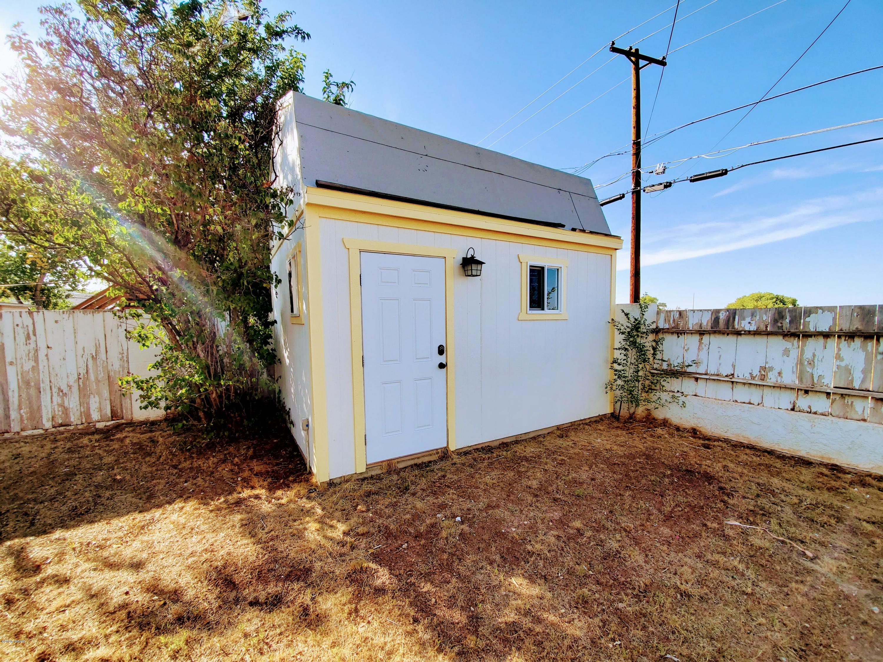 300 South 8th Street Snowflake, AZ 85937 - Photo 16 of 18 a view of a house with a backyard