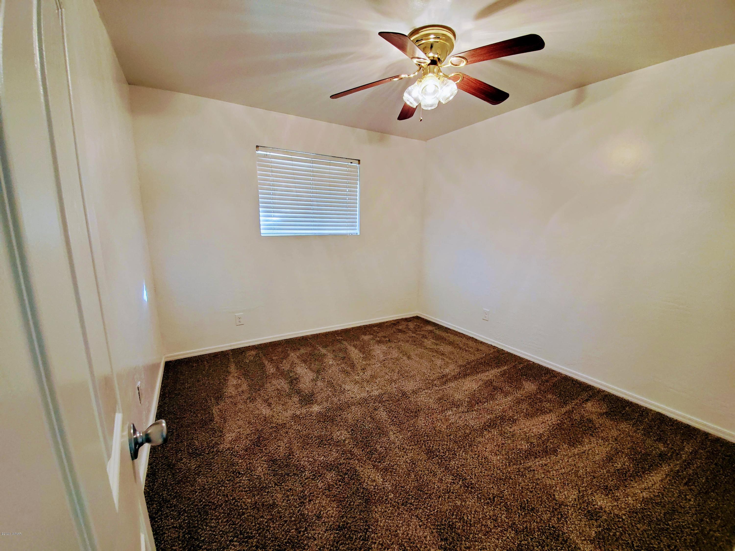 300 South 8th Street Snowflake, AZ 85937 - Photo 8 of 18 wooden floor in a empty room