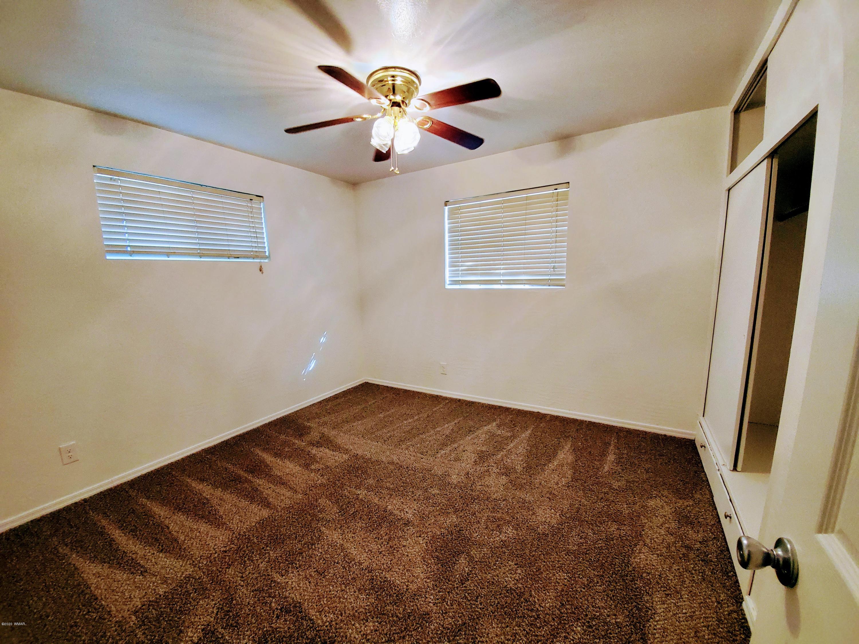 300 South 8th Street Snowflake, AZ 85937 - Photo 9 of 18 a view of an empty room with a window
